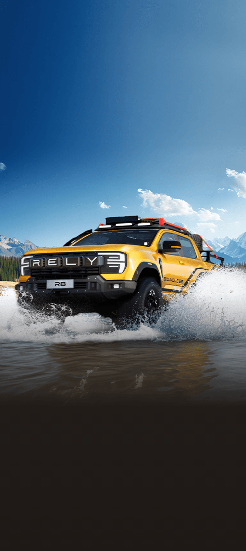 A bright yellow off-road truck splashes through water under a blue sky with mountains.