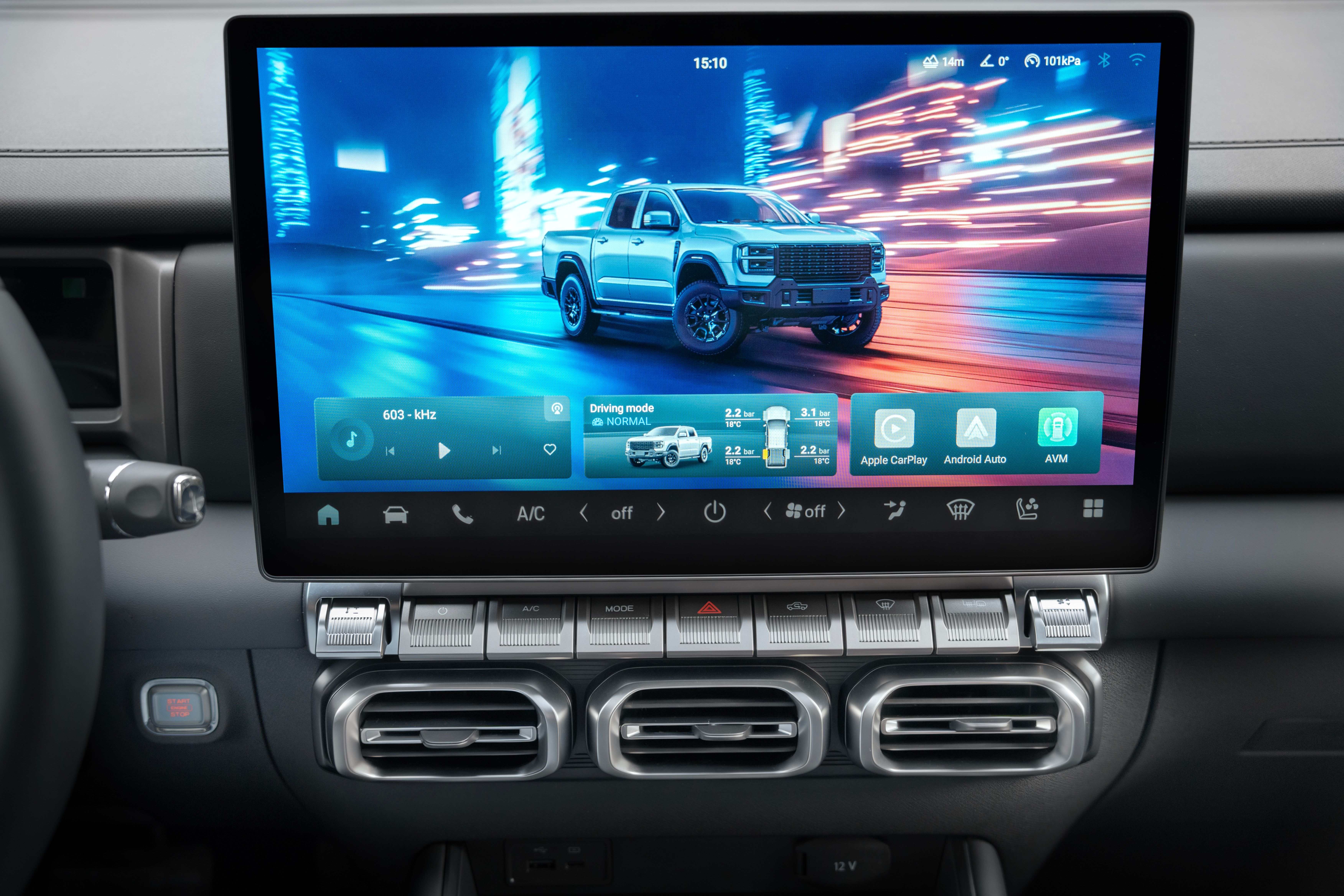 Car infotainment screen displaying a white pickup truck on a digital city street.