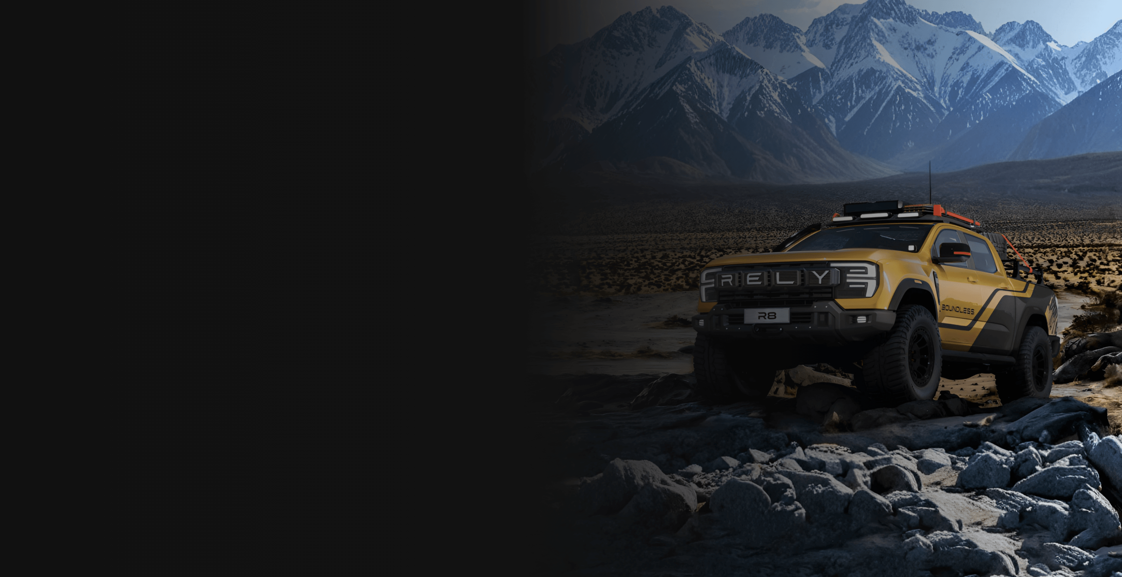 Yellow off-road truck parked on rocky mountain terrain under a cloudy sky.